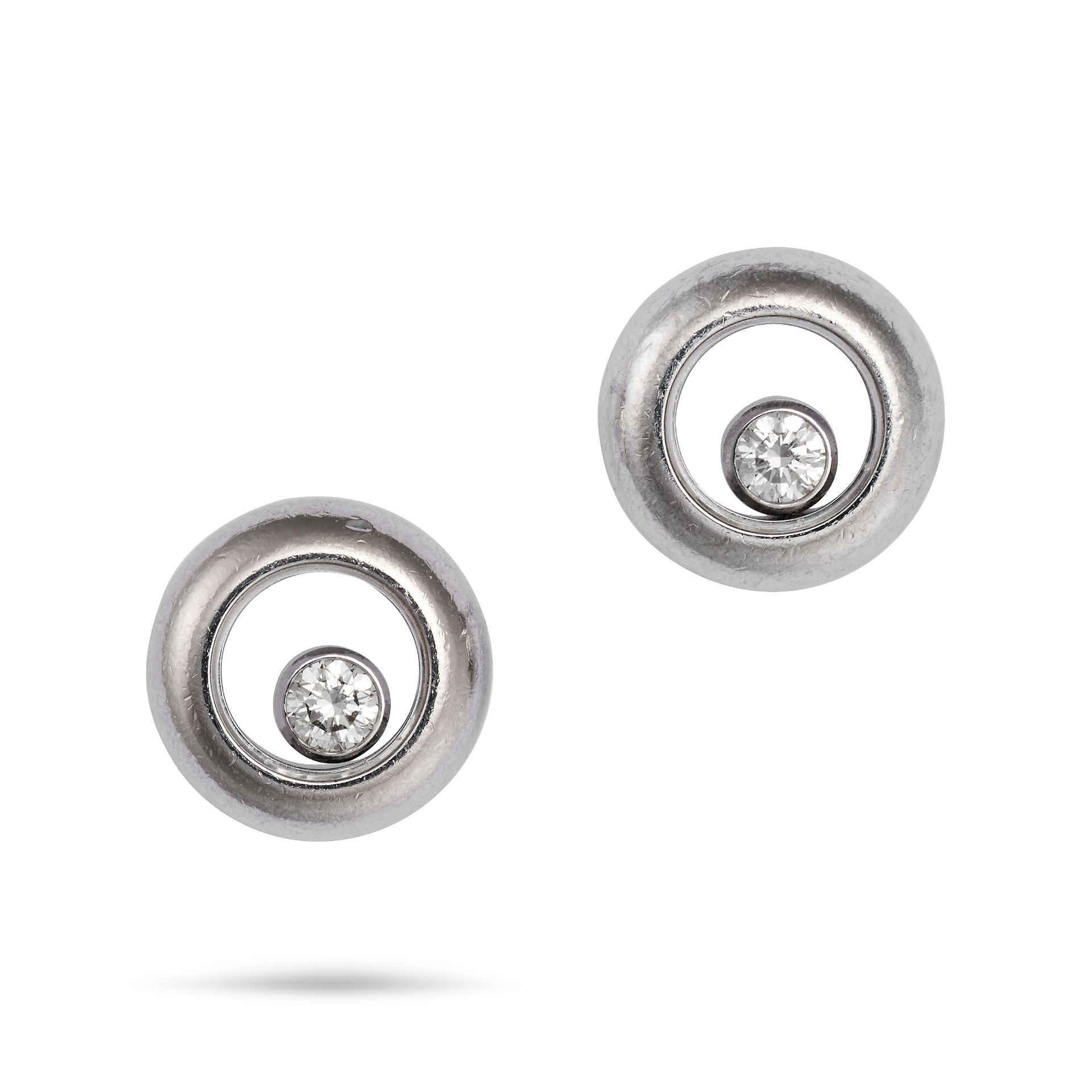 CHOPARD, A PAIR OF HAPPY DIAMONDS ICON EARRINGS in 18ct white gold, each comprising a free moving...