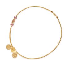 A THALI PENDANT NECKLACE in 22ct yellow gold, accented by synthetic rubies and colourless stones,...