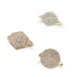 A COLLECTION OF THREE DIAMOND RINGS in 9ct yellow gold, one set with a circular cluster of round ...