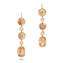 A PAIR OF ANTIQUE TOPAZ AND DIAMOND DROP EARRINGS in yellow gold, each set with two round and a c...