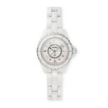 CHANEL -  A CHANEL J12 WRISTWATCH in ceramic and stainless steel, the circular mother of pearl di...