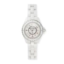 CHANEL -  A CHANEL J12 WRISTWATCH in ceramic and stainless steel, the circular mother of pearl di...