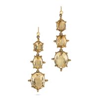 A PAIR OF ANTIQUE CITRINE DROP EARRINGS each set with three oval cut citrines, accented by gold b...