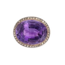 NO RESERVE - AN ANTIQUE AMETHYST AND DIAMOND BROOCH in yellow gold and platinum, set with an oval...