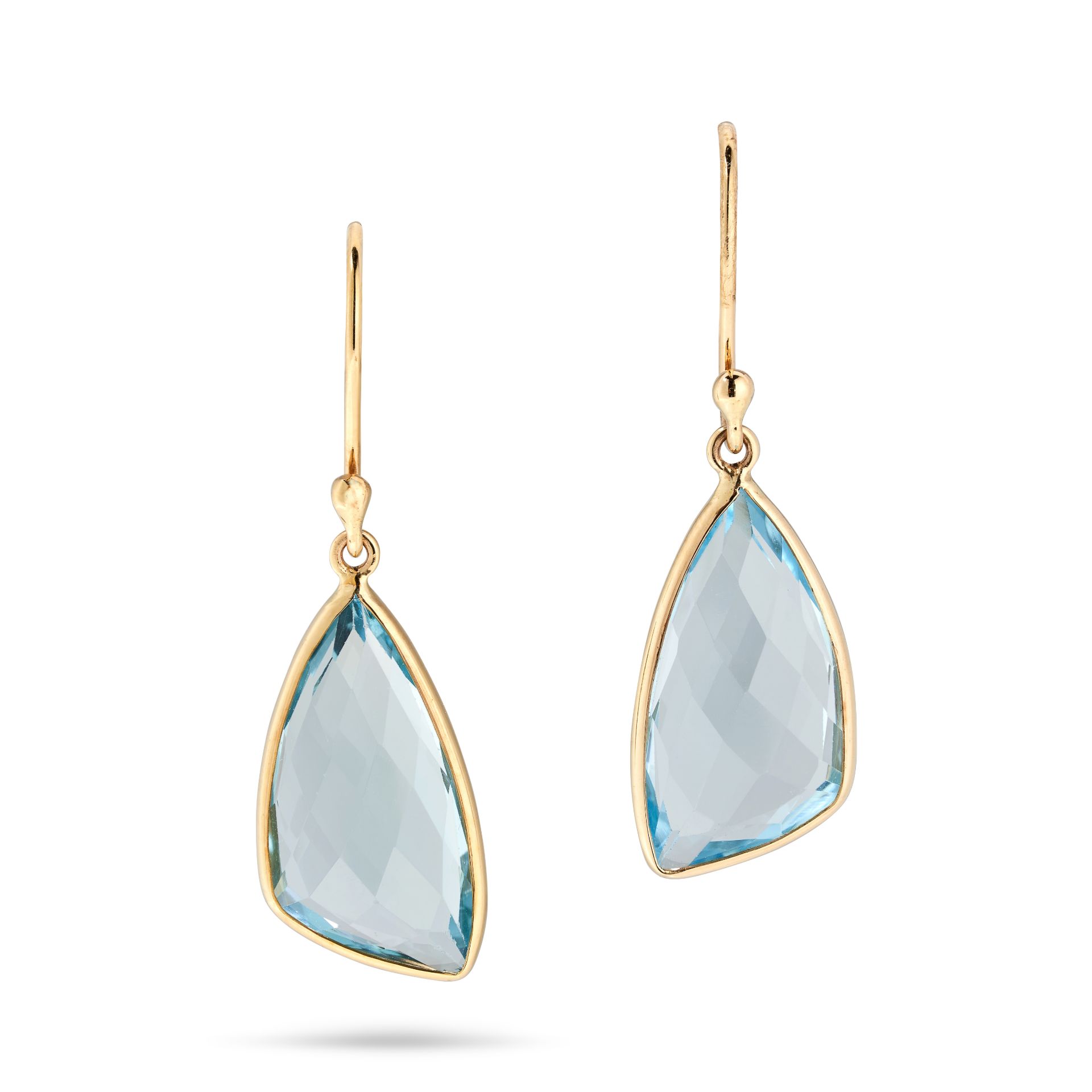 A PAIR OF BLUE TOPAZ DROP EARRINGS in 18ct yellow gold, each set with a fancy cut blue topaz, sta...
