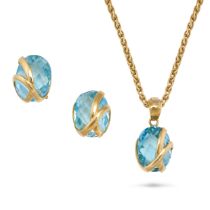 A BLUE TOPAZ PENDANT & EARRINGS SUITE in 18ct yellow gold, the earrings set with oval faceted blu...