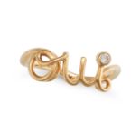 DIOR, A DIORAMOUR RING in 18ct yellow gold, designed as the cursive word 'OUI' accented by a roun...