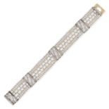 CARTIER, AN ANTIQUE FRENCH SEED PEARL AND DIAMOND BRACELET in 18ct gold, comprising a lattice of ...