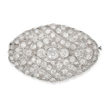 A FINE ART DECO DIAMOND BROOCH in platinum, the openwork oval shaped body set throughout with old...