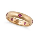 CARTIER, A RUBY STELLA BAND RING in 18ct yellow gold, set with five round cut rubies, signed Cart...