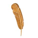 HERMES, A GOLD FEATHER BROOCH in 18ct yellow gold, designed as a feather, signed Hermes Paris and...