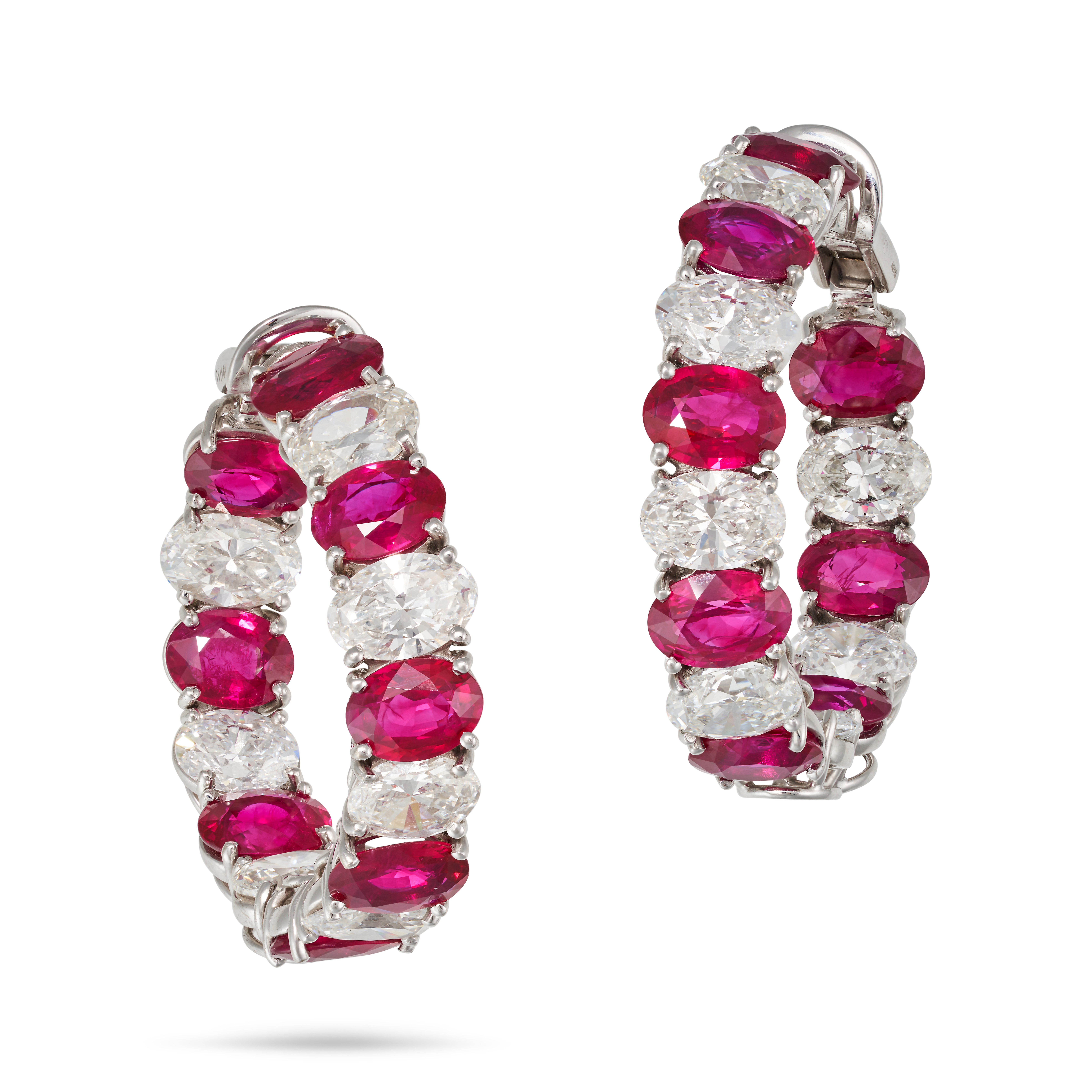 GRAFF, AN IMPORTANT PAIR OF RUBY AND DIAMOND HOOP EARRINGS in 18ct white gold, each designed as a...
