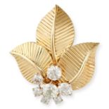 CARTIER, A DIAMOND LEAF BROOCH in 18ct yellow gold, designed as three leaves accented by a cluste...