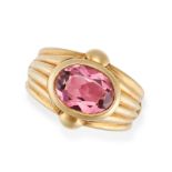 BULGARI, A PINK TOURMALINE RING in 18ct yellow gold, set with an oval cut pink tourmaline of appr...