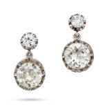 A PAIR OF DIAMOND DROP EARRINGS in white gold and platinum, each set with an old cut diamond susp...