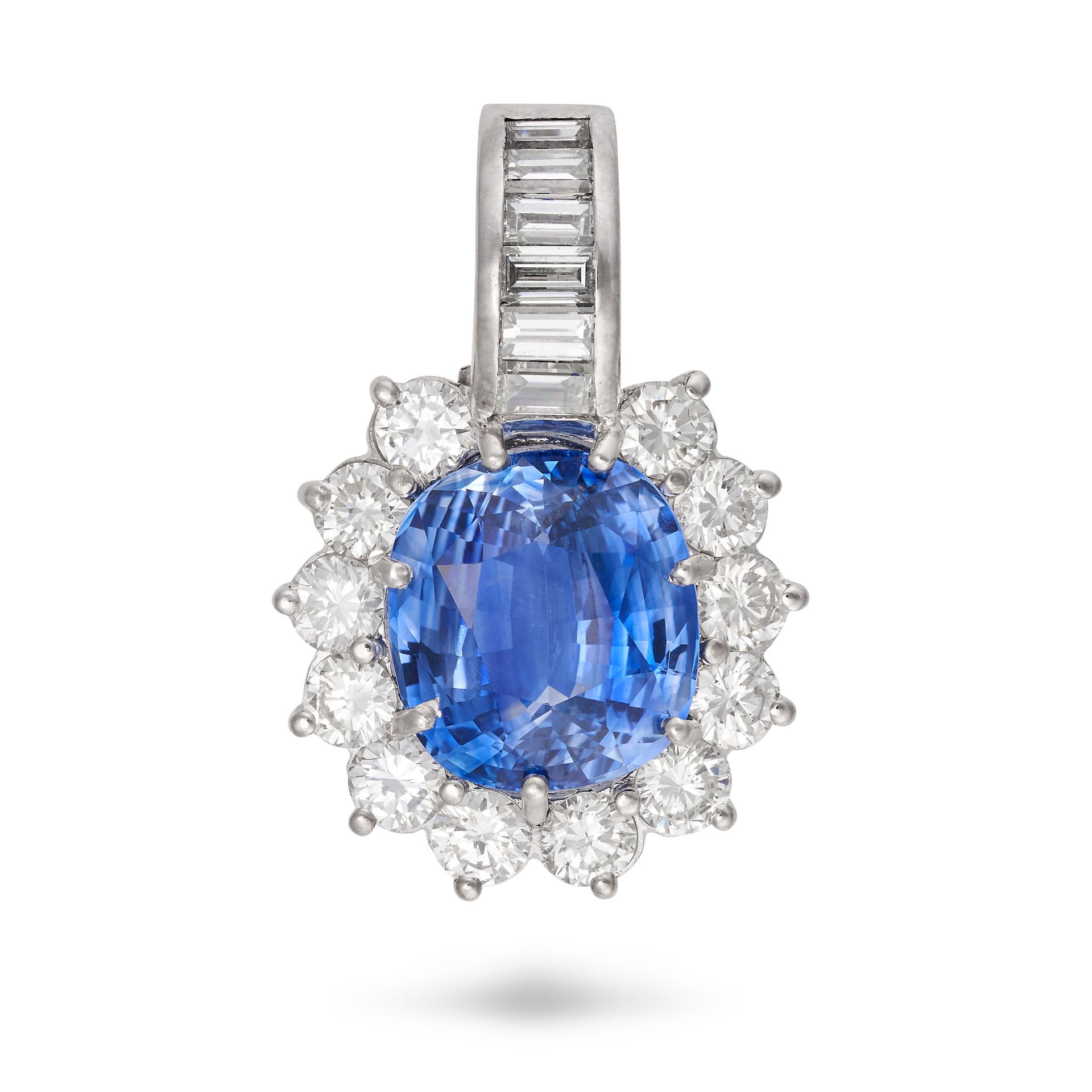 A SAPPHIRE AND DIAMOND CLUSTER PENDANT in 18ct white gold, set with a cushion cut sapphire of 7.8...