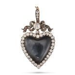 AN ANTIQUE DIAMOND AND ROCK CRYSTAL HEART LOCKET PENDANT in yellow gold and silver, set with a he...