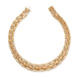 TIFFANY & CO., A DIAMOND SIGNATURE NECKLACE in 18ct yellow gold, comprising three strands of flut...