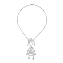 A FINE DIAMOND PENDANT NECKLACE in 18ct white gold, the foliate style pendant comprising an artic...