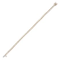 TIFFANY & CO., A VICTORIA DIAMOND LINE BRACELET in 18ct yellow gold, set with a row of round bril...