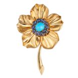 CARTIER, A TURQUOISE AND SAPPHIRE FLOWER BROOCH, 1958 in 18ct yellow gold, designed as a flower s...