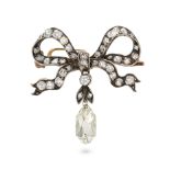 AN ANTIQUE DIAMOND BOW BROOCH in yellow gold and silver, designed as a bow set with old and rose ...