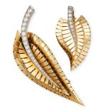 VAN CLEEF & ARPELS, A PAIR OF DIAMOND LEAF BROOCHES in 18ct yellow and white gold, each designed ...
