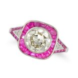 A RUBY AND DIAMOND TARGET RING in 14ct white gold, set with an old cut diamond of approximately 1...
