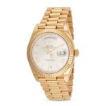 ROLEX - A ROLEX DAY DATE 40 in yellow gold, 228238, 022YXXXX, c.2018, the circular silvered dial ...