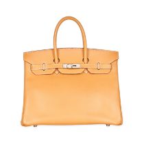 HERMES, A NATURELLE BIRKIN 35 BAG Condition grade C. Produced in 1999. 35cm long, 31cm high. To...