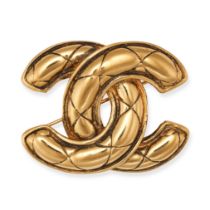 CHANEL, A VINTAGE CC BROOCH plated in 24ct gold, designed as a quilted interlocking 'CC' logo, si...