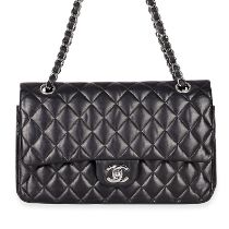 CHANEL BLACK LAMBSKIN MEDIUM CLASSIC FLAP BAG Condition grade C+. Produced between 2006 and 200...