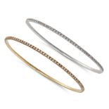 A PAIR OF DIAMOND BANGLES in 14ct yellow and white gold, each set all around with a row of round ...