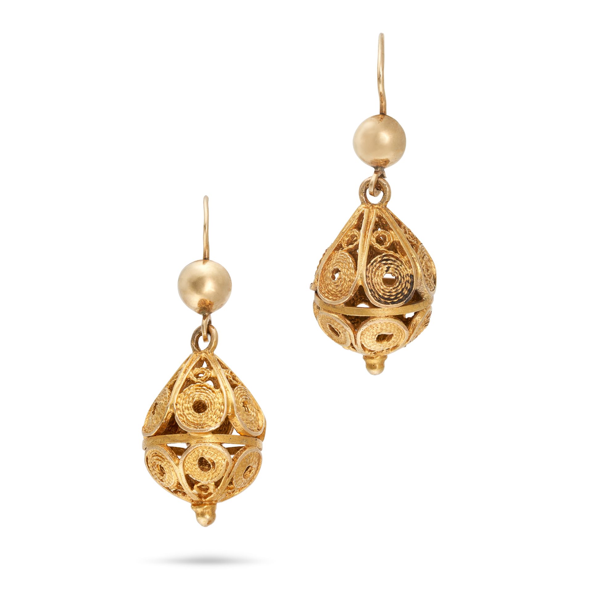 A PAIR OF ANTIQUE VICTORIAN EARRINGS in yellow gold, each earring in an ornate filigree design, n...