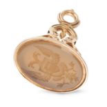 AN ANTIQUE AGATE INTAGLIO FOB in yellow gold, set with an agate carved to depict a crest of a dou...