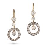 A PAIR OF DIAMOND DROP EARRINGS in yellow gold and silver, each comprising a row of round brillia...