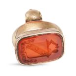 AN ANTIQUE CARNELIAN INTAGLIO FOB SEAL in yellow gold, set with carnelian engraved with a coat of...