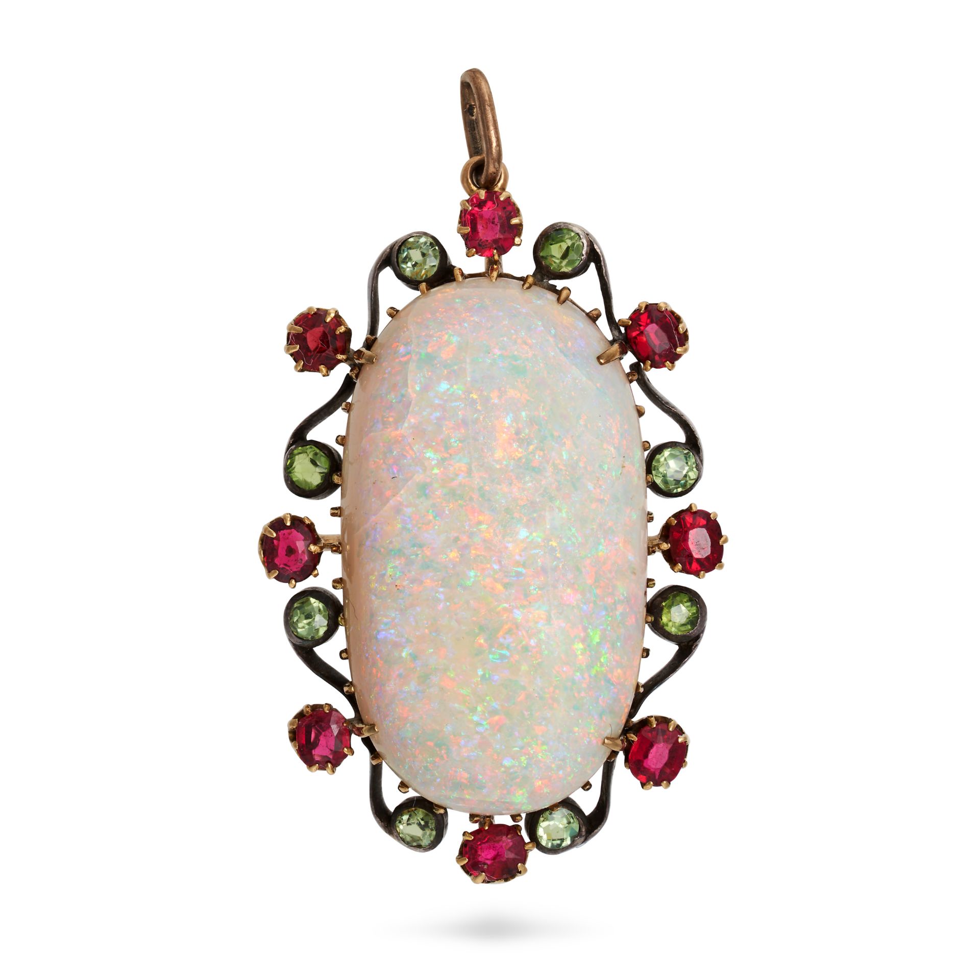 AN ANTIQUE OPAL, RUBY AND GREEN GARNET PENDANT in yellow gold and silver, set with an oval caboch...