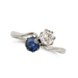A SAPPHIRE AND DIAMOND TOI ET MOI RING in white gold, set with a round cut sapphire and an old cu...