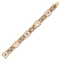 AN ANTIQUE EDWARDIAN RUBY AND DIAMOND GATE BRACELET in 15ct yellow gold, the multi row chain brac...
