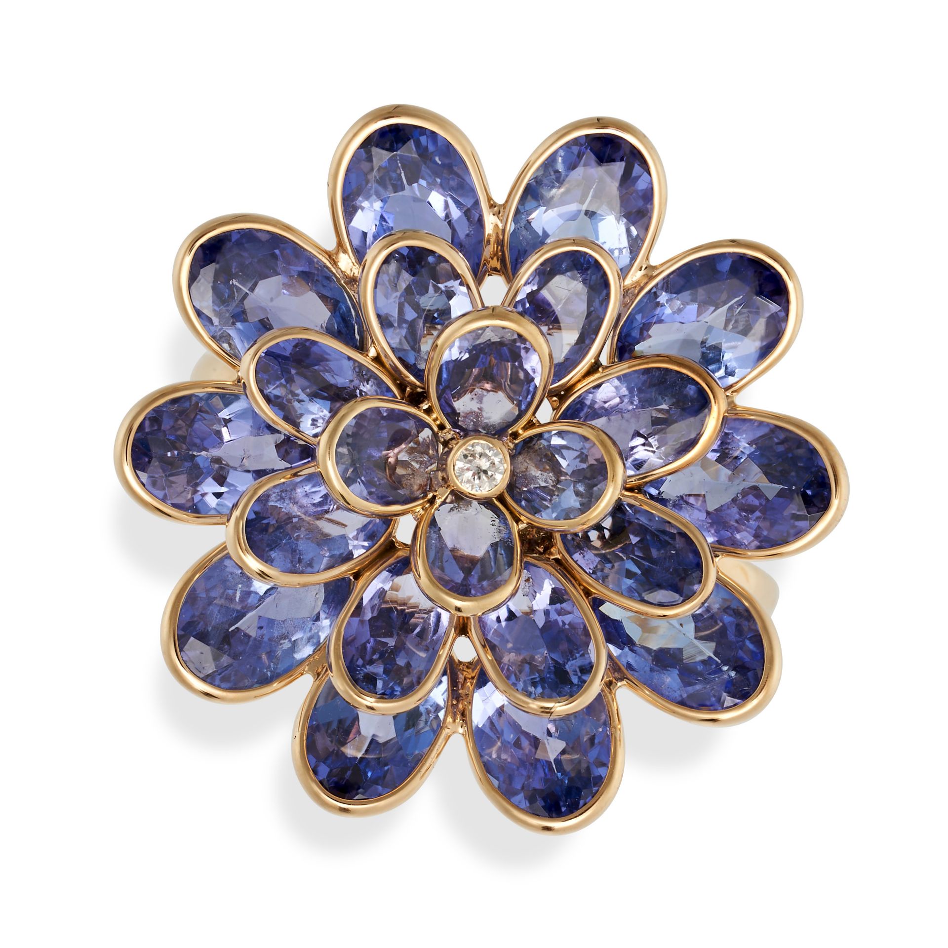A TANZANITE AND DIAMOND FLOWER RING in 18ct yellow gold, set with a round brilliant cut diamond i...