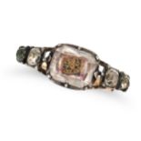 AN ANTIQUE STUART CRYSTAL MOURNING RING, 18TH CENTURY in yellow gold and silver, comprising a wir...