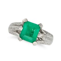 AN EMERALD AND DIAMOND RING in 18ct white gold, set with an octagonal step cut emerald of approxi...
