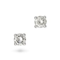 A PAIR OF DIAMOND STUD EARRINGS in 18ct white gold, each set with a round brilliant cut diamond o...