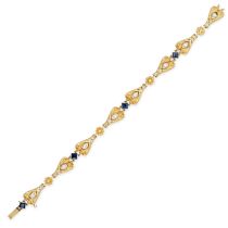 A FRENCH SAPPHIRE AND DIAMOND BRACELET in 18ct yellow gold, comprising a row of links designed as...