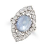 A SAPPHIRE AND DIAMOND DRESS RING in white gold, set with an oval cabochon sapphire of approximat...