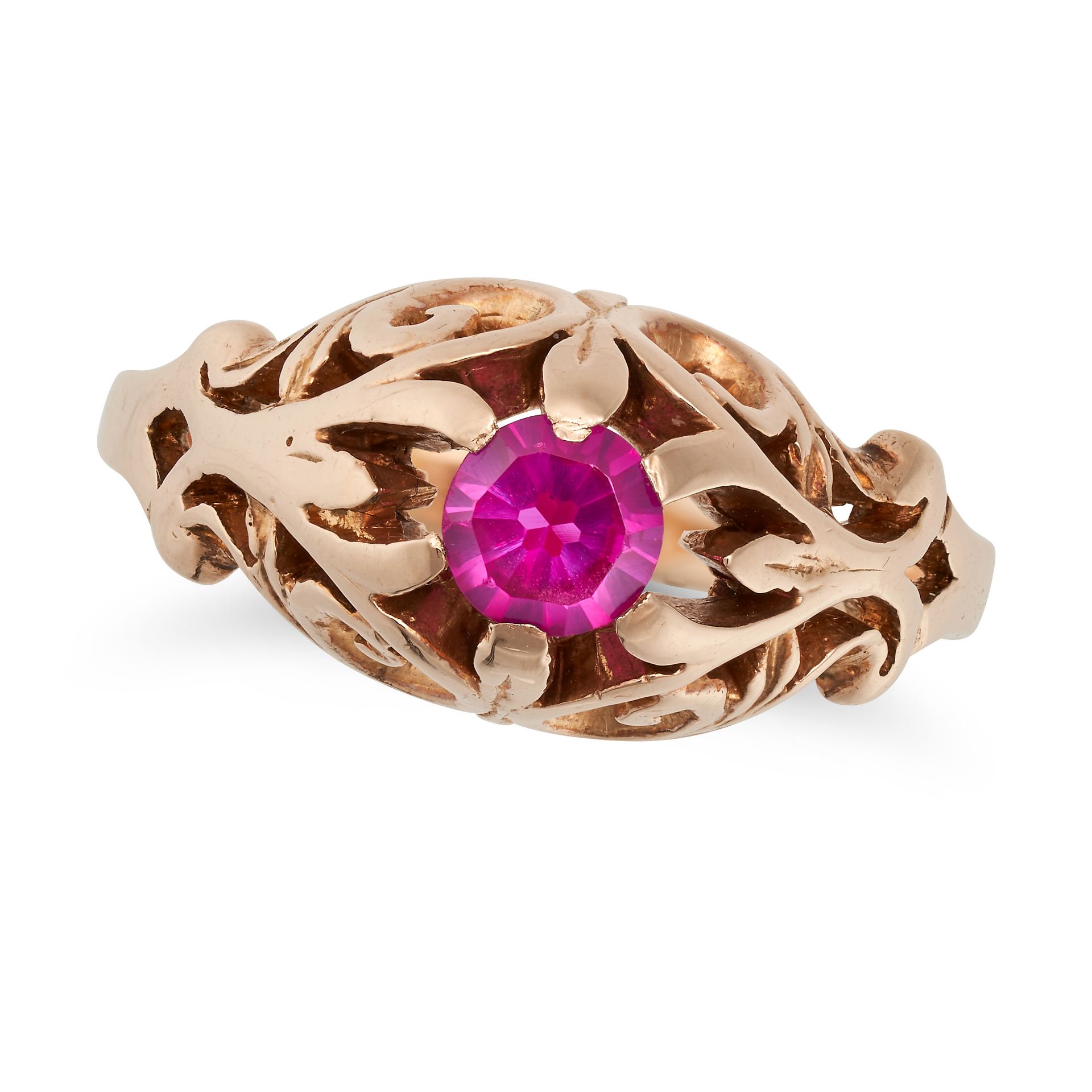 A SYNTHETIC PINK SAPPHIRE RING in yellow gold, set with a round cut synthetic pink sapphire, no a...