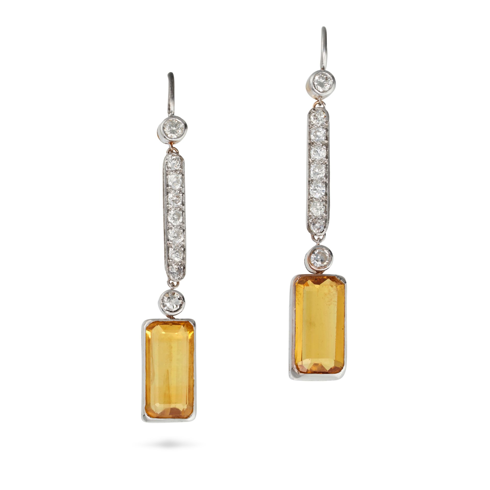A PAIR OF YELLOW SAPPHIRE AND DIAMOND DROP EARRINGS in white gold, each comprising a row of round...
