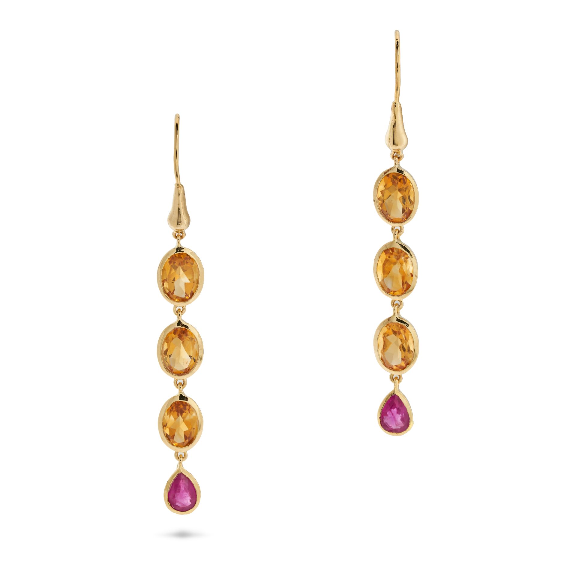 A PAIR OF CITRINE AND RUBY DROP EARRINGS in 14ct yellow gold, each comprising a row of oval cut c...