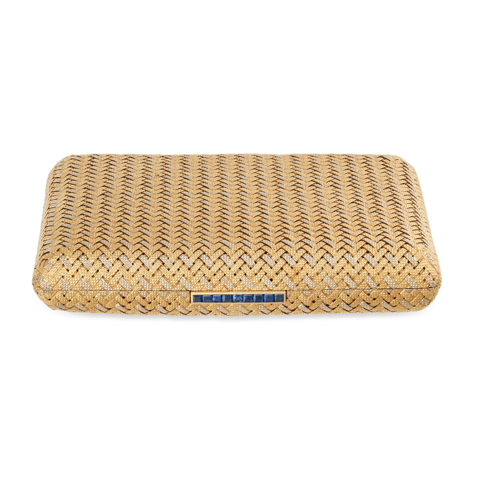 HERMES, A SAPPHIRE COMPACT in 18ct yellow and white gold, the hinged compact in woven design, the...